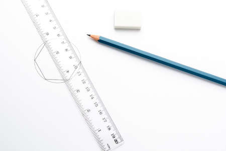 Accessories for drawing on a white sheet of paperの写真素材