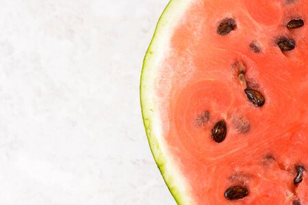 The red watermelon on the table close-up view from aboveの写真素材