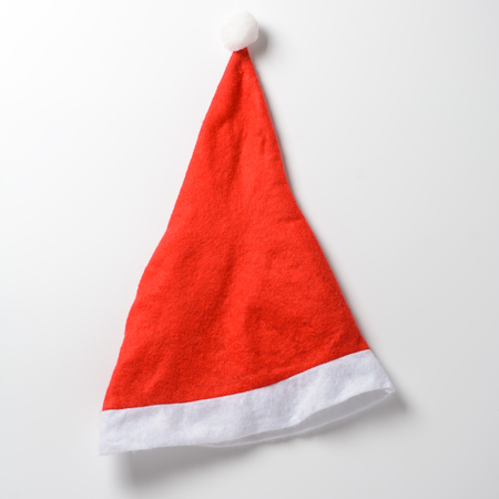 Red and white Santa's hat on a white backgroundの写真素材