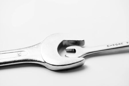 Wrenches of different sizes on a white backgroundの写真素材