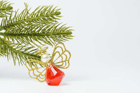 Toys and spruce branches on a white backgroundの写真素材