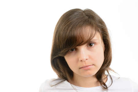 Portrait of a young woman on a white backgroundの写真素材