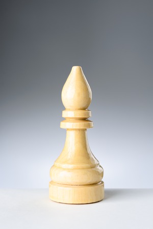 White elephant on a white table on gradient backgroundの写真素材