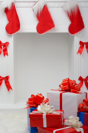 New Year gifts near the white fireplaceの写真素材