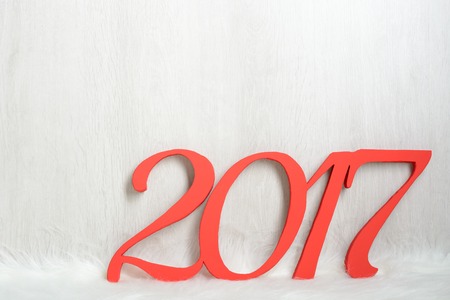 The number 2017 in red on a white carpet of artificial furの写真素材