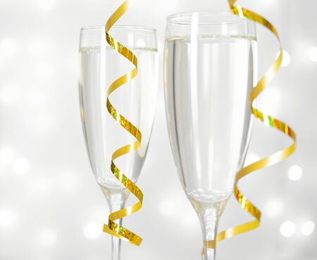 Two glasses of champagne and New Year decorationsの写真素材