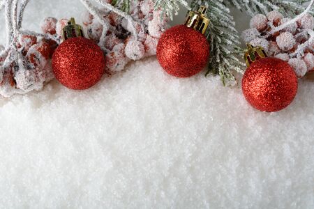 New year decorations lying on the white snowの写真素材