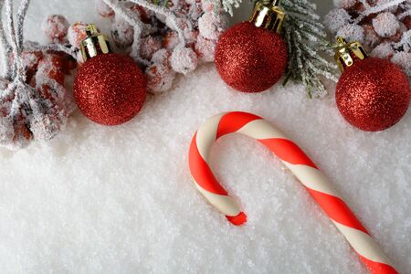 New year decorations lying on the white snowの写真素材