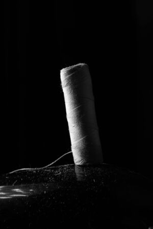 Retro elements of the sewing machine on a black background closeupの写真素材
