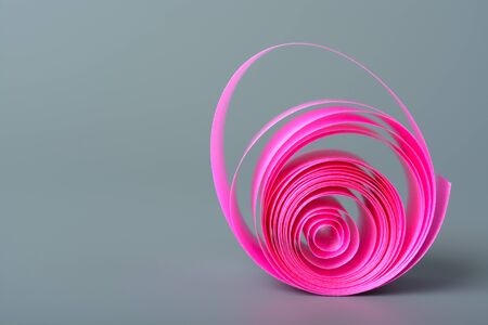 Decorative ribbon for decorating a box with a gift on a gray backgroundの写真素材