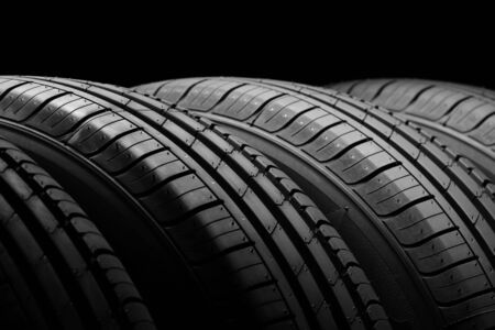 Car tires on black backgroundの写真素材