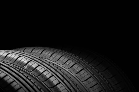 Car tires on black backgroundの写真素材