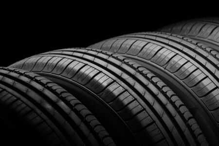 Car tires on black backgroundの写真素材