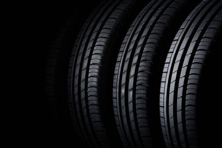 Car tires on black backgroundの写真素材