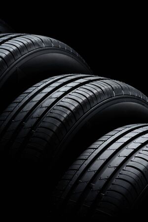 Car tires on black backgroundの写真素材