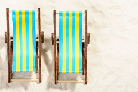 Two sunbeds on the beach: top viewの写真素材