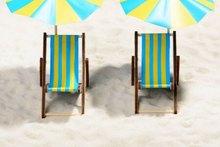 Two sunbeds on the beach: top viewの写真素材