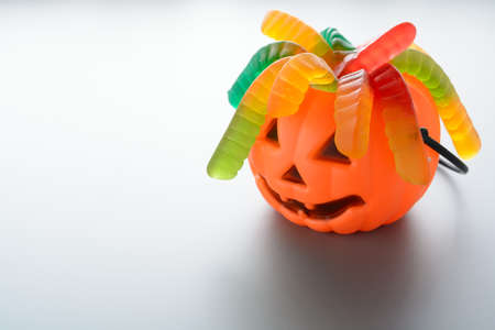 Halloween pumpkin bucket with candy