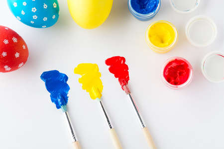 Painting eggs for Easter holiday. Top viewの写真素材