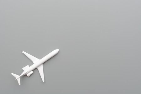 Toy plane on gray backgroundの写真素材
