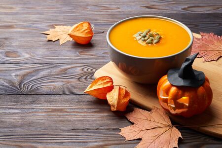 Pumpkin soup on the table. Vegan food. Halloween.の写真素材