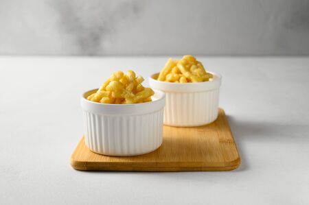 National food cuisine of the Middle East. Two ramekin with chak chak on a white table. Horizontal orientationの写真素材