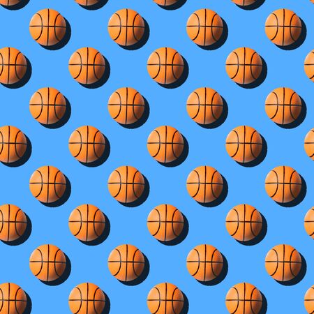 Basketball balls seamless pattern on pastel blue background.の写真素材