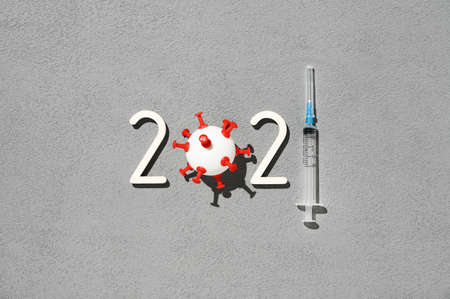 The 2021 - year of mass vaccination against COVID-19 of the world population, the concept of victory...
