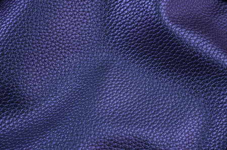 Natural textured leather background. Toned in trendy Color Of The Year 2022 - Very Peri.の写真素材