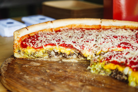 Cheeseburger Cake Delight: A Tasty Festival Treat Blending Burger and Cake at a Vibrant Street Food Event.の写真素材