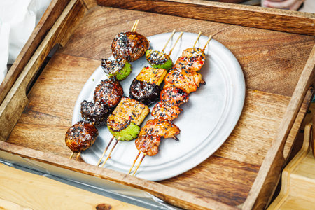 Barbecue Chicken Plate: Grilled Meat and Vegetables at a Street Food Festival.の写真素材