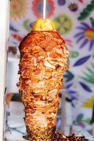 Rotating Kebab on a Grill: Roasting Lamb and Shwarma at a Street Food Festival.の写真素材