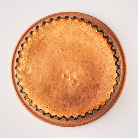 Traditional Apple Pie Charlotte: Homemade Delight with Cinnamon and Apples on a White Background.の写真素材