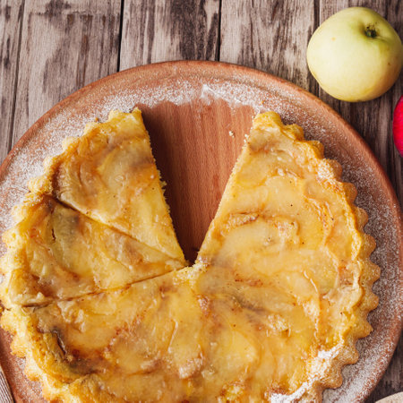 Traditional Apple Pie Charlotte: Delicious and Homemade on a Rustic Wooden Table.の写真素材