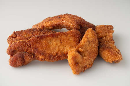 Golden Crispy Chicken Strips: A Tasty American Fast Food Favorite.の写真素材