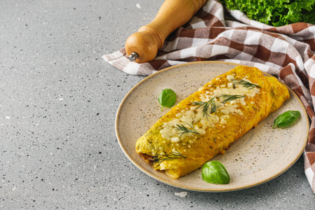 Delicious Homemade Omelette: Fresh Ingredients with Cheese, Mushrooms, and Vegetables.の写真素材