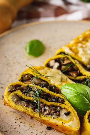 Delicious Homemade Omelette: Fresh Ingredients with Cheese, Mushrooms, and Vegetables.の写真素材