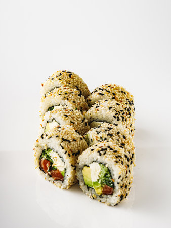 Fresh Sushi Rolls with Salmon and Tuna, Japanese Cuisine on a Gourmet Seafood Plate.の写真素材