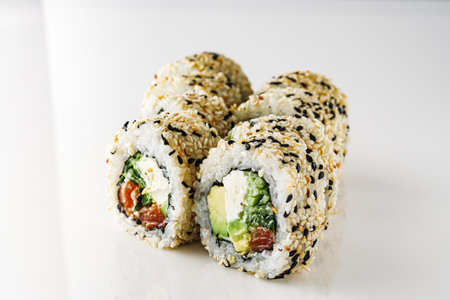 Fresh Sushi Rolls with Salmon and Tuna, Japanese Cuisine on a Gourmet Seafood Plate.の写真素材