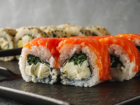 Fresh Sushi Rolls with Salmon and Tuna, Japanese Cuisine on a Gourmet Seafood Plate.の写真素材