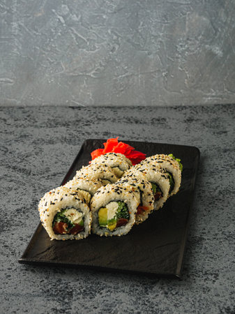 Fresh Sushi Rolls with Salmon and Tuna, Japanese Cuisine on a Gourmet Seafood Plate.の写真素材