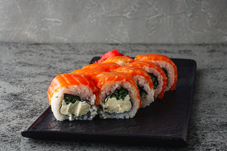 Fresh Sushi Rolls with Salmon and Tuna, Japanese Cuisine on a Gourmet Seafood Plate.の写真素材