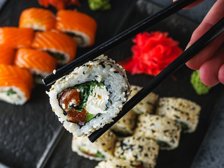 Fresh Sushi Rolls with Salmon and Tuna, Japanese Cuisine on a Gourmet Seafood Plate.の写真素材