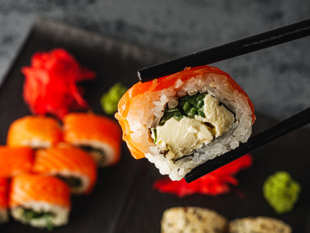Fresh Sushi Rolls with Salmon and Tuna, Japanese Cuisine on a Gourmet Seafood Plate.の写真素材