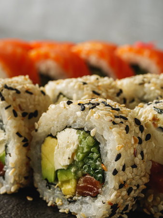 Fresh Sushi Rolls with Salmon and Tuna, Japanese Cuisine on a Gourmet Seafood Plate.の写真素材
