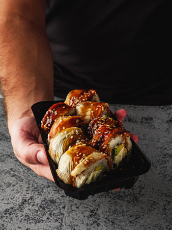 Fresh Sushi Rolls with Salmon and Tuna, Japanese Cuisine on a Gourmet Seafood Plate.の写真素材