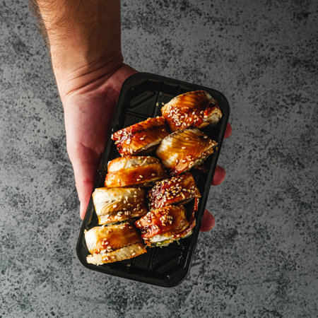 Fresh Sushi Rolls with Salmon and Tuna, Japanese Cuisine on a Gourmet Seafood Plate.の写真素材