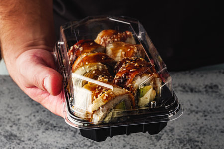 Fresh Sushi Rolls with Salmon and Tuna, Japanese Cuisine on a Gourmet Seafood Plate.の写真素材