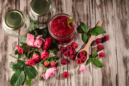 Fresh Raspberries: Juicy, Ripe Berries for a Healthy Summer Snack on a Wooden Background.の写真素材