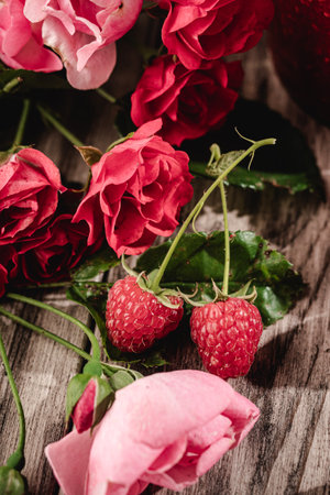 Fresh Raspberries: Juicy, Ripe Berries for a Healthy Summer Snack on a Wooden Background.の写真素材